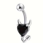 piercing de corazon plateado de ombligo