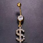 Piercing de ombligo con diseño de dolar dorado