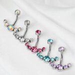 Piercing de ombligo de esferas plateados